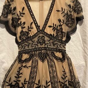 Honey Belle EUC nude and black lace romper 
Gorgeous